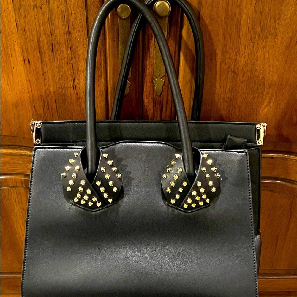 Black handbag.